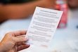 (Trevor Christensen | The Salt Lake Tribune) A participant at The Salt Lake Tribune's Your Vote, Your Voice event holds a copy of conversation agreements on Oct. 15, 2024.