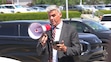 (Rick Egan | The Salt Lake Tribune)  Phil Lyman reads a prepared speech from his phone after his records request was denied at the Utah State Records Committee hearing, on Thursday, July 18, 2024.
