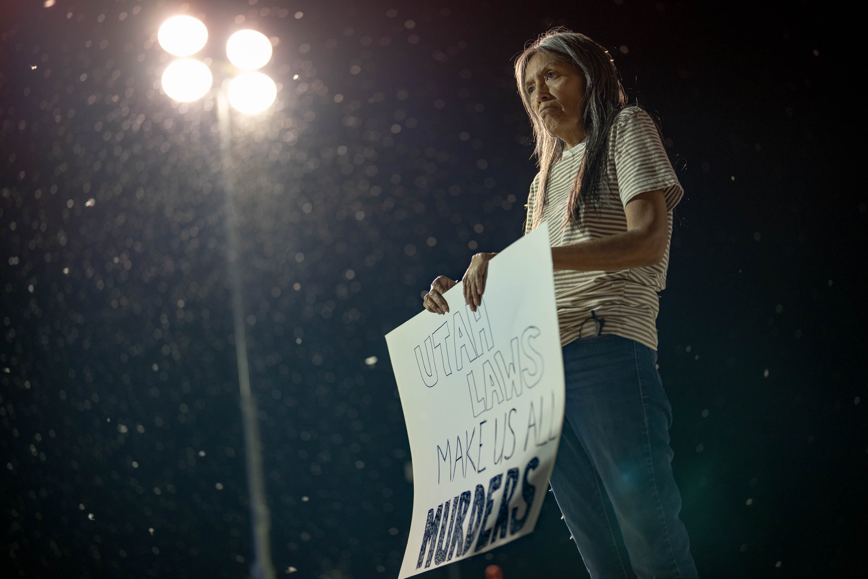 (Francisco Kjolseth | The Salt Lake Tribune) Janell Wilson of Layton joins the death penalty protest at a free speech zone outside the Utah State Correctional Facility in Salt Lake City, Wednesday, Aug. 7, 2024.