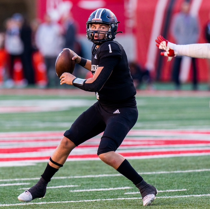 (Rick Egan | The Salt Lake Tribune) Corner Canyon QB Isaac Wilson (1) looks downfield before connecting with for a touchdown, in 6A State playoff action between the Corner Canyon Chargers and the Skyridge Falcons, at Rice-Eccles Stadium, on Friday, Nov. 17, 2023.