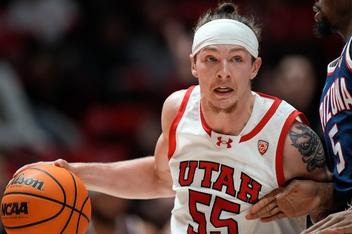 (Francisco Kjolseth  |  The Salt Lake Tribune) Utah Utes guard Gabe Madsen (55) drives the ball in PAC-12 basketball action between the Utah Utes and the Arizona Wildcats at the Jon M. Huntsman Center, on Thursday, Feb. 8, 2024.