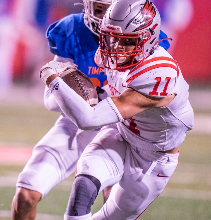 (Rick Egan | The Salt Lake Tribune)   Faletau Satuala runs for a Bountiful touchdown, in 5A State playoff action between the Timpview Thunderbirds and the Bountiful Redhawks, at Rice-Eccles Stadium, on Friday, Nov. 17, 2023.
