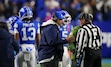 (Bethany Baker  |  The Salt Lake Tribune) Brigham Young Cougars head coach Kalani Sitake speaks with a referee during the game against the Kansas Jayhawks in Provo on Saturday, Nov. 16, 2024.