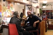 (Naomi Cragun | The Salt Lake Tribune) Moody's Art Cafe owner Taylor Wilson, right, chats with his mother, Natalie Wilson, at the new Logan cafe on Thursday, Feb. 13, 2025.