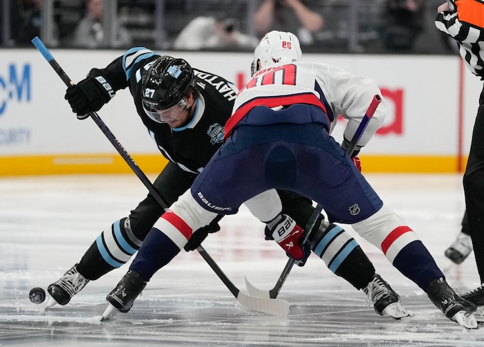 (Francisco Kjolseth  | The Salt Lake Tribune) Utah Hockey Club center Barrett Hayton (27) squares off with Washington Capitals left wing Pierre-Luc Dubois (80) during an NHL hockey game at the Delta Center in Salt Lake City on Monday, Nov. 18, 2024.