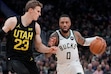 (Morry Gash | AP) Milwaukee Bucks' Damian Lillard tries to get past Utah Jazz's Lauri Markkanen during the first half of an NBA basketball game Thursday, Nov. 7, 2024, in Milwaukee.