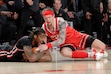 (Michael Wyke | AP) Houston forward Ja'Vier Francis, right, recovers a loose ball for a turnover as Utah guard Gabe Madsen, right, dives in during the first half of an NCAA college basketball game, Wednesday, Jan. 22, 2025, in Houston.