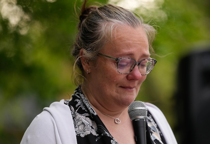 (Francisco Kjolseth  |  The Salt Lake Tribune) Annie Cowley, secretary at Uintah Elementary in Salt Lake City speaks during a candlelight memorial at Laird Park on Wednesday, May 22, 2024, to honor Adlai Owen. Police say Adlai’s father, Sam Owen, fatally shot Adlai before killing himself in an apparent murder-suicide on Saturday, May 18, 2024.