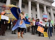 (Francisco Kjolseth  | The Salt Lake Tribune) Jesse Chief performs a fancy dance as people gather on the steps of the Utah Capitol during a rally, organized by Southern Utah Wilderness Alliance, in support of protecting public lands on Saturday, Jan. 11, 2025.