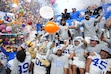 BYU players and coaches celebrate after their win over Colorado in the Alamo Bowl NCAA college football game, Saturday, Dec. 28, 2024, in San Antonio. (AP Photo/Eric Gay)