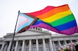 (Bethany Baker  |  The Salt Lake Tribune) A Progress Pride flag waves in front of the Utah Capitol during the Rally for Trans Community Support in Salt Lake City Friday, Jan. 24, 2025.