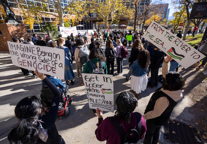 (Rick Egan | The Salt Lake Tribune)  Supporters of Mecha cheer along with the speakers, during a protest on the University of Utah Campus, on Wednesday, Nov. 15, 2023.
