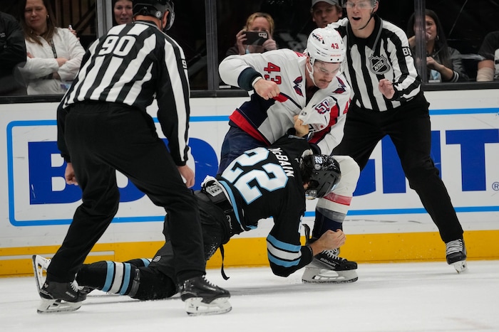 (Francisco Kjolseth  | The Salt Lake Tribune) Utah Hockey Club center Jack McBain (22) fights Washington Capitals right wing Tom Wilson (43) during an NHL hockey game at the Delta Center in Salt Lake City on Monday, Nov. 18, 2024.