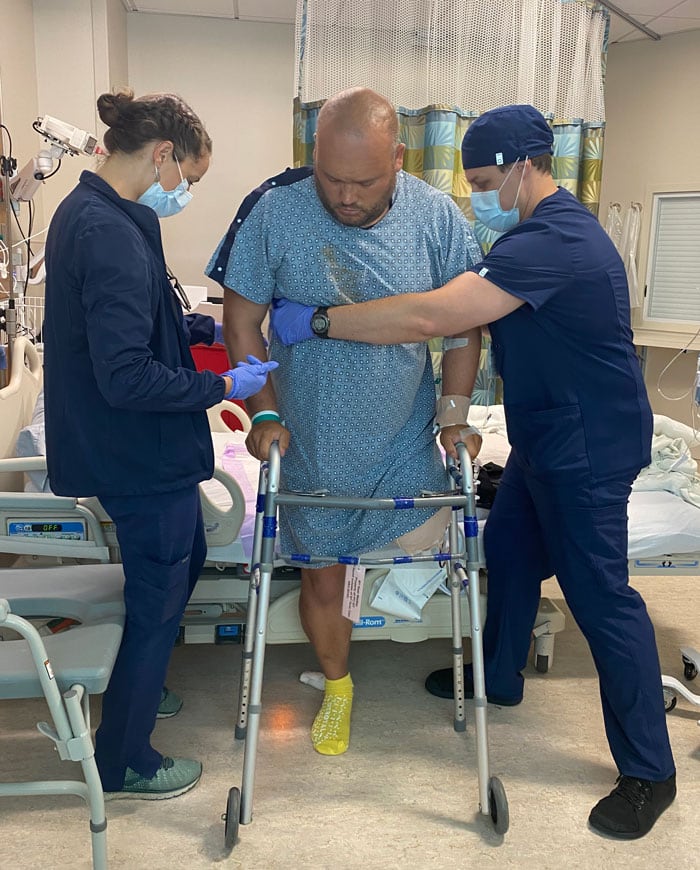 (Matt Brown) Former Army parachute rigger Matt Brown is assisted from bed. Brown was shocked when a vendor repossessed an ankle joint that improved his mobility because he said the VA hadn’t paid the bill. Brown says he was interviewed in July by investigators as part of a probe, spurred by his complaints, that encompasses several VA sites in North Carolina.