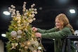 (Rick Egan | The Salt Lake Tribune) Ruby Thackeray, an 11-year-old cancer patient who was treated at Primary Children's Medical Center, puts a star on a tree, for the Festival of Trees, at the Mountain America Expo Center in Sandy, on Tuesday, Dec 3, 2024.

