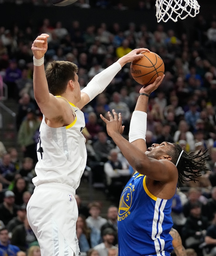 (Francisco Kjolseth  |  The Salt Lake Tribune) Utah Jazz center Walker Kessler (24) blocks Golden State Warriors forward Kevon Looney (5) during an NBA basketball game Thursday, Feb. 15, 2024, in Salt Lake City.