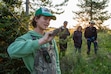 (Ryan Ash | Weber State University) Weber State zoology student Connor Johnson speaks to faculty and donors at a fundraising event in July 2024 at Yellowstone National Park, where the school looks to open a new field station.