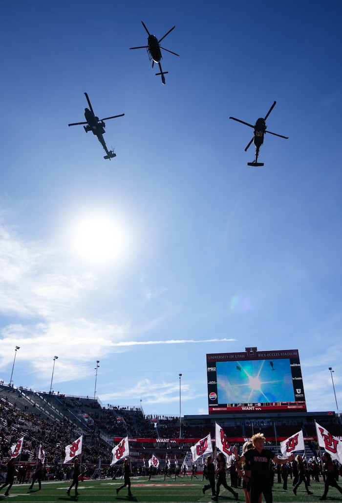 (Francisco Kjolseth  |  The Salt Lake Tribune) Military choppers fly over the Utah stadium before the start of the game against the Arizona State Sun Devils in Salt Lake City on Saturday, Nov. 4, 2023.