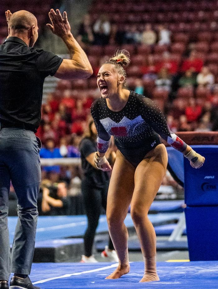 (Rick Egan | The Salt Lake Tribune)  Makenna Smith reacts after her vault for Utah, in Gymnastics actin between Utah, LSU, Oklahoma and UCLA at the Maverik Center, on Saturday, Jan. 13, 2024.
