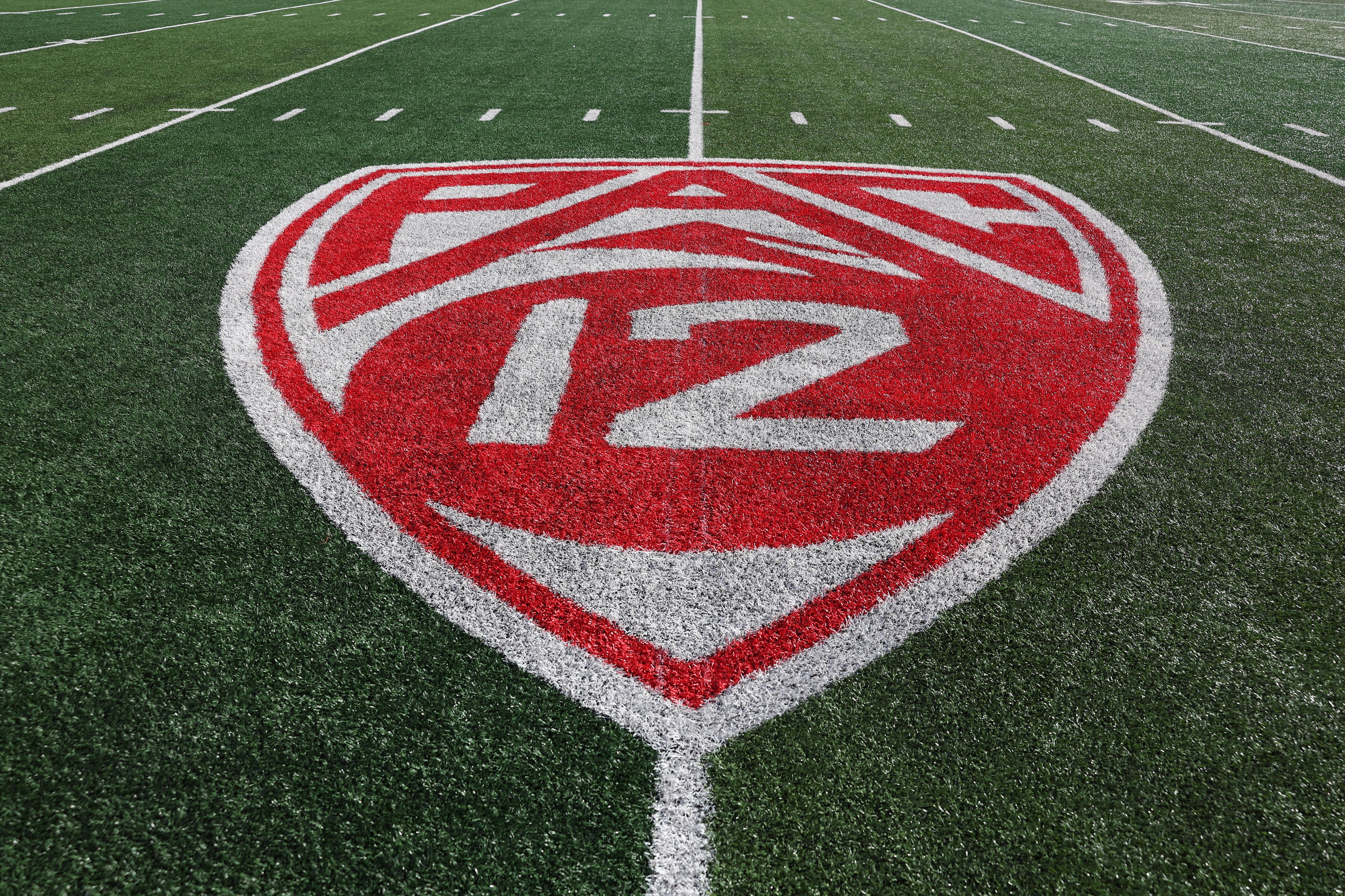 (Rob Gray | AP) A general view of of the Pac-12 logo at Rice Eccles Stadium before an NCAA college football game between Utah and Colorado, Saturday, Nov. 25, 2023, in Salt Lake City.
