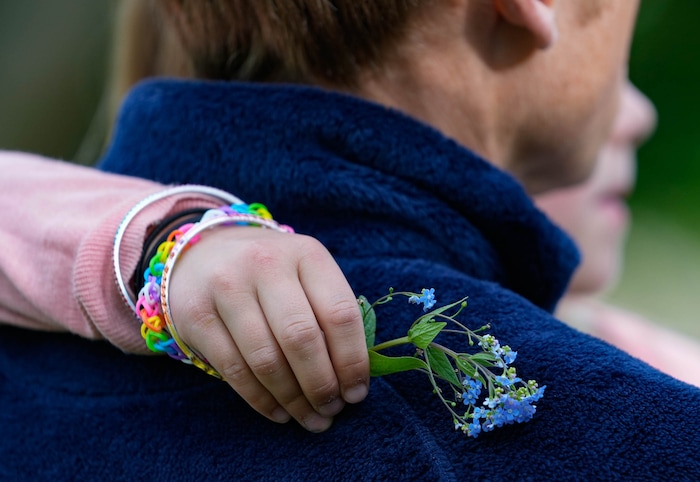 (Francisco Kjolseth  |  The Salt Lake Tribune) People gather for a memorial at Laird Park in Salt Lake City on Wednesday, May 22, 2024, to honor Adlai Owen. Police say Adlai’s father, Sam Owen, fatally shot Adlai before killing himself in an apparent murder-suicide on Saturday, May 18, 2024.