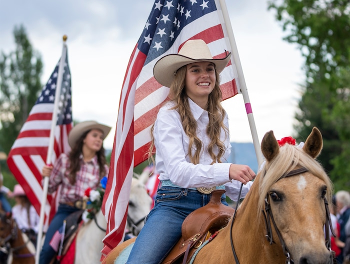 (Rick Egan | The Salt Lake Tribune) The Holker sisters ride their horses in the Liberty Days parade in Liberty, Utah, on Tuesday, July 4, 2023. 