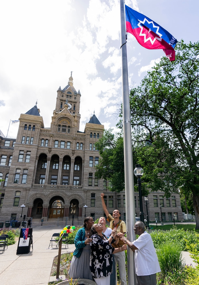 (Rick Egan | The Salt Lake Tribune)  The Junteenth Flag is raised at City Hall during a flag-raising ceremony Monday, June 19, 2023.
