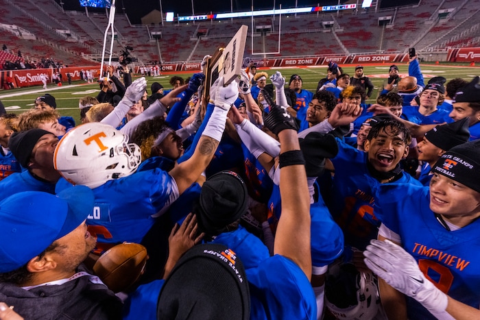 (Rick Egan | The Salt Lake Tribune)   The Timpview Thunderbirds celebrate their 5A State Championship over the Bountiful Redhawks, at Rice-Eccles Stadium, on Friday, Nov. 17, 2023.
