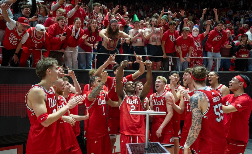 (Rick Egan | The Salt Lake Tribune) The Utes celebrate their overtime win over BYU, in Big 12 basketball action between the Utah Utes and the Brigham Young Cougars, at the Jon M. Huntsman Center, on Saturday, Jan 18, 2025.