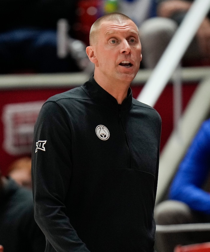 (Bethany Baker  |  The Salt Lake Tribune) Brigham Young Cougars head coach Mark Pope calls to his players during the game against the Utah Utes at the Jon M. Huntsman Center in Salt Lake City on Saturday, Dec. 9, 2023.