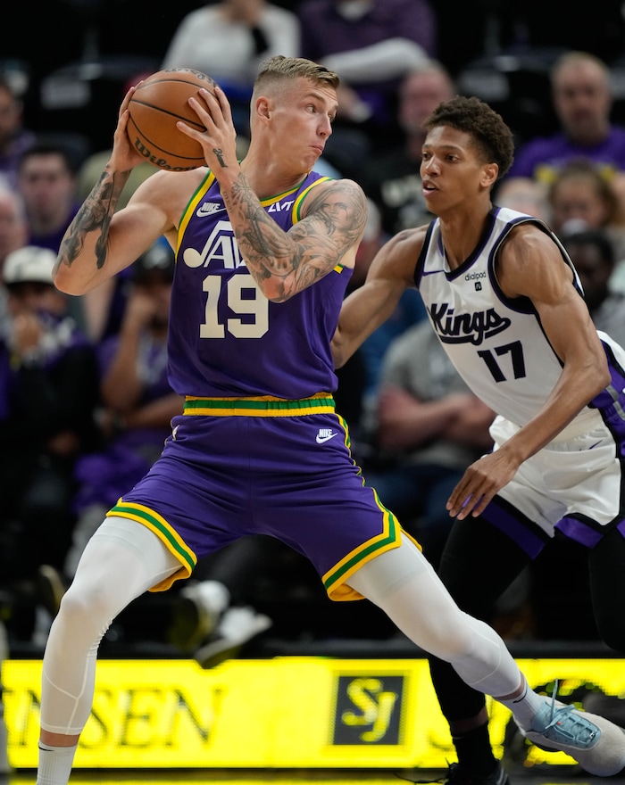 (Francisco Kjolseth  |  The Salt Lake Tribune) Utah Jazz forward Luka Samanic (19) and Sacramento Kings forward Kessler Edwards (17) as the Utah Jazz host the Sacramento Kings, during NBA basketball in Salt Lake City on Wednesday, Oct. 25, 2023.