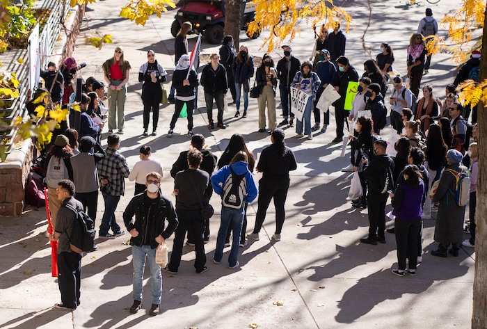 (Rick Egan | The Salt Lake Tribune)  Supporters of Mecha cheer listen to the speakers, during a protest on the University of Utah Campus, on Wednesday, Nov. 15, 2023.
