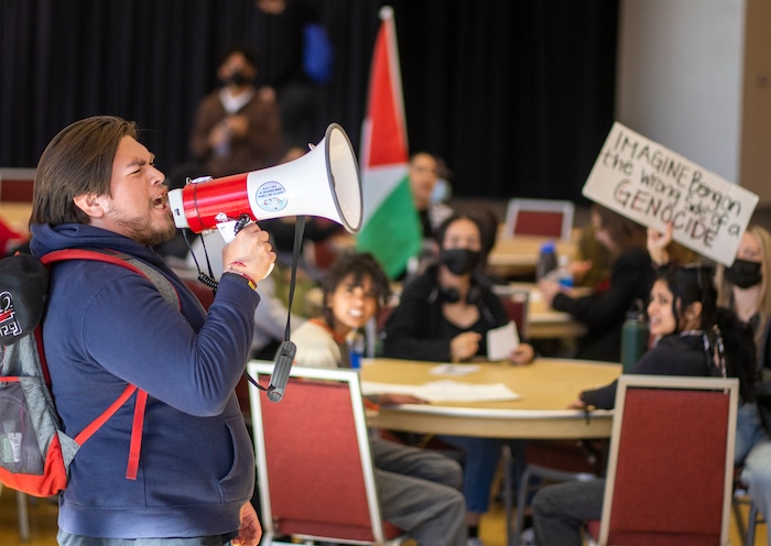 (Rick Egan | The Salt Lake Tribune)  Julio Irungaray leads the crowd in a chant during a sit-in, as the group Mecha occupies the Union Ballroom during a protest on the University of Utah Campus, on Wednesday, Nov. 15, 2023.