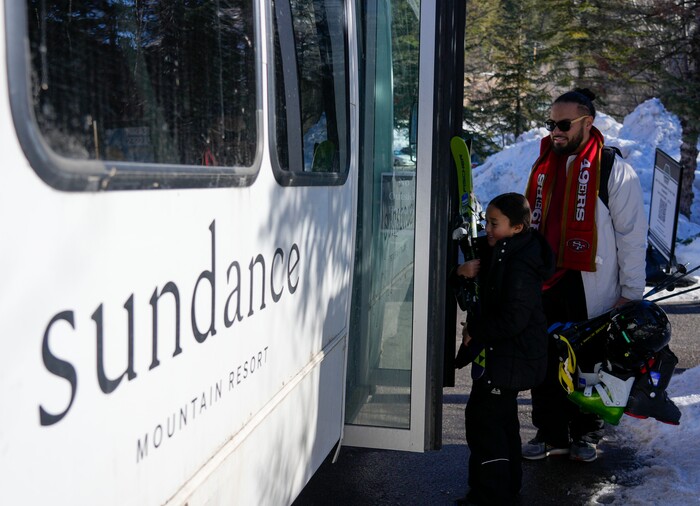 (Bethany Baker  |  The Salt Lake Tribune) People get onto the shuttle at Sundance Resort near Provo on Thursday, Dec. 14, 2023.