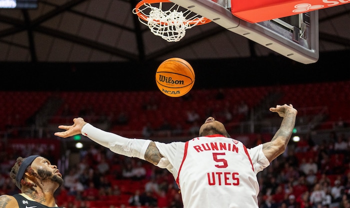 (Rick Egan | The Salt Lake Tribune) Utah guard Deivon Smith (5) gets a big dunk for the Utes, in PAC-12 basketball action between the Utah Utes and the Colorado Buffaloes a the Jon M. Huntsman Center, on Saturday, Feb. 3, 2024.
