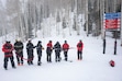 (Rick Egan | The Salt Lake Tribune) Ski patrol and staff at Canyons Village at Park City Mountain resort cut a ribbon to open the "Another World" ski run for the first time on Tuesday, Dec 17, 2024. Park City Mountain ski patrollers officially went on strike early Friday, citing unfair labor practices.