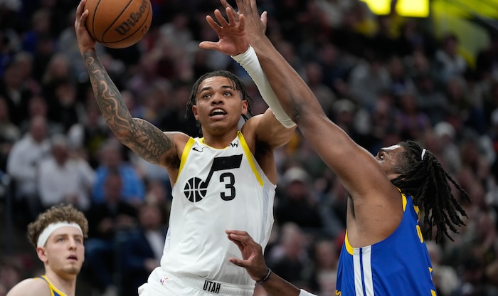 (Francisco Kjolseth  |  The Salt Lake Tribune) Utah Jazz guard Keyonte George (3) drives the ball agains the Warriors during an NBA basketball game Thursday, Feb. 15, 2024, in Salt Lake City.