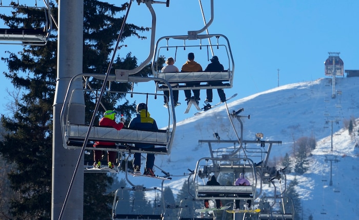 (Bethany Baker  |  The Salt Lake Tribune) Skiers and snowboarders ride the lift at Sundance Resort near Provo on Thursday, Dec. 14, 2023.