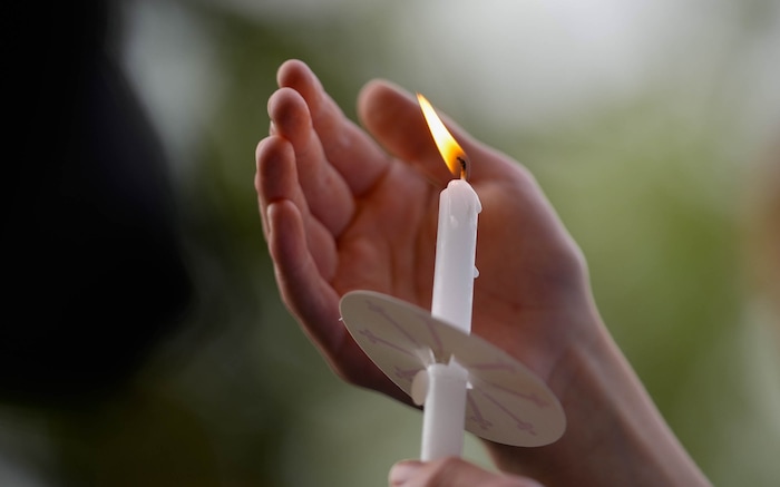 (Francisco Kjolseth  |  The Salt Lake Tribune) Uintah Elementary schoolmates gather for a candlelight memorial at Laird Park in Salt Lake City on Wednesday, May 22, 2024, to honor Adlai Owen. Police say Adlai’s father, Sam Owen, fatally shot Adlai before killing himself in an apparent murder-suicide on Saturday, May 18, 2024.