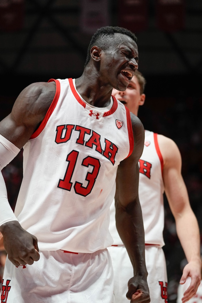 (Francisco Kjolseth  |  The Salt Lake Tribune) Utah Utes center Keba Keita (13) celebrates a hard fought shot in PAC-12 basketball action between the Utah Utes and the Arizona Wildcats at the Jon M. Huntsman Center, on Thursday, Feb. 8, 2024.