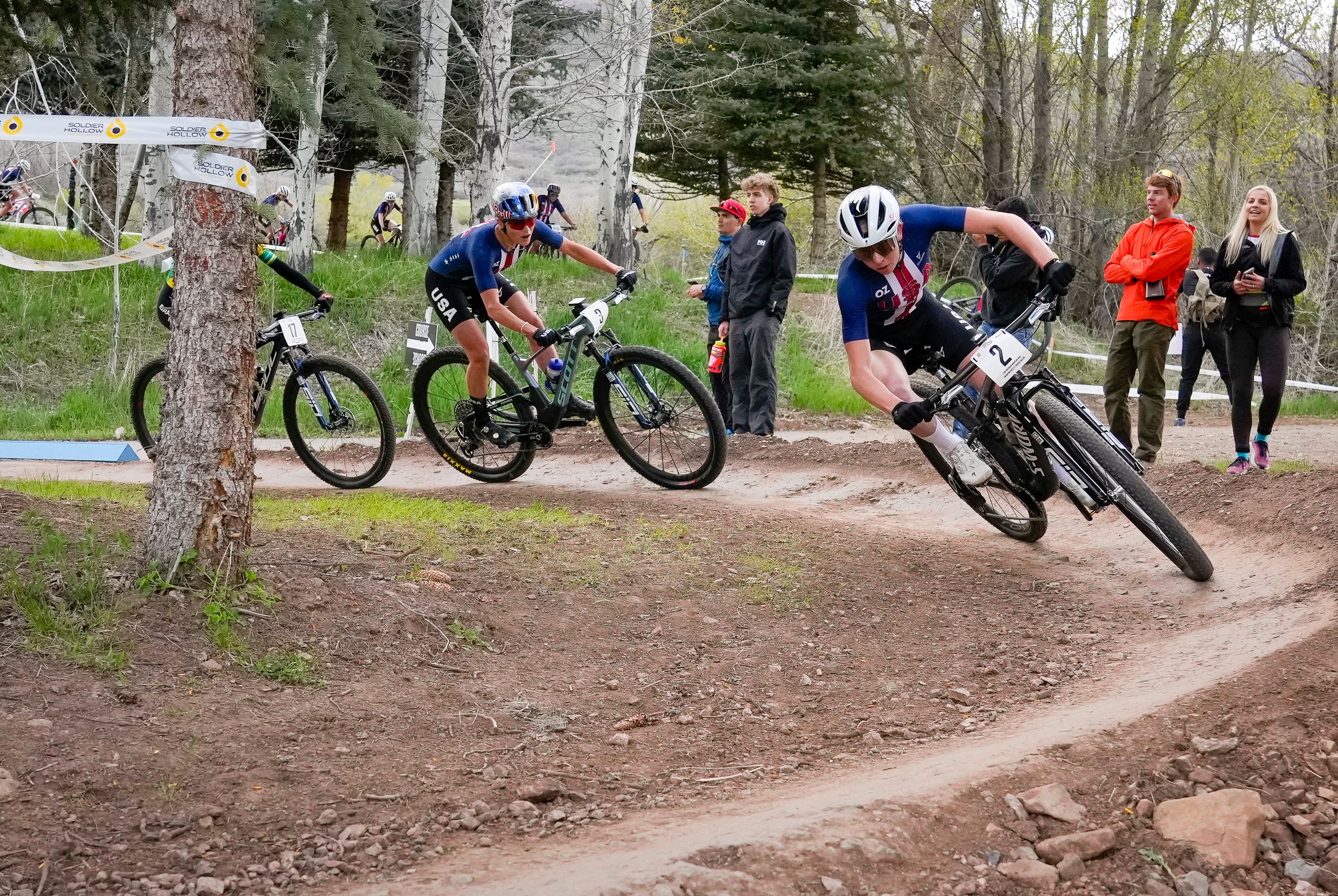 (Bethany Baker | The Salt Lake Tribune) Haley Batten, right, competes in the Elite Women Short Track race during the Pan American Mountain Biking Championships at Soldier Hollow Nordic Center in Midway on Friday, May 10, 2024.