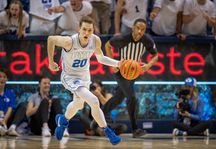 (Rick Egan | The Salt Lake Tribune) Brigham Young guard Spencer Johnson (20) leads a fast break for the Cougars, in basketball action between the Brigham Young Cougars and the Texas Longhorns, at the Marriott Center, on Saturday, Jan. 27, 2024.
