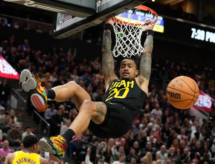 (Francisco Kjolseth  |  The Salt Lake Tribune) Utah Jazz forward John Collins (20) dunks during an NBA basketball game Wednesday, Feb. 14, 2024, in Salt Lake City.