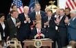 (Francisco Kjolseth  |  The Salt Lake Tribune) President Donald Trump surrounded by Utah elected officials at the Utah Capitol on Monday, Dec. 4, 2017, as he signed a presidential proclamation to shrink Bears Ears National Monument.