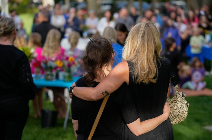 (Francisco Kjolseth  |  The Salt Lake Tribune) People gather for a memorial at Laird Park in Salt Lake City on Wednesday, May 22, 2024, to honor Adlai Owen. Police say Adlai’s father, Sam Owen, fatally shot Adlai before killing himself in an apparent murder-suicide on Saturday, May 18, 2024.