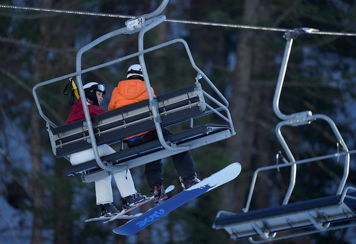 (Bethany Baker  |  The Salt Lake Tribune) Two people ride the lift at Sundance Resort near Provo on Thursday, Dec. 14, 2023.