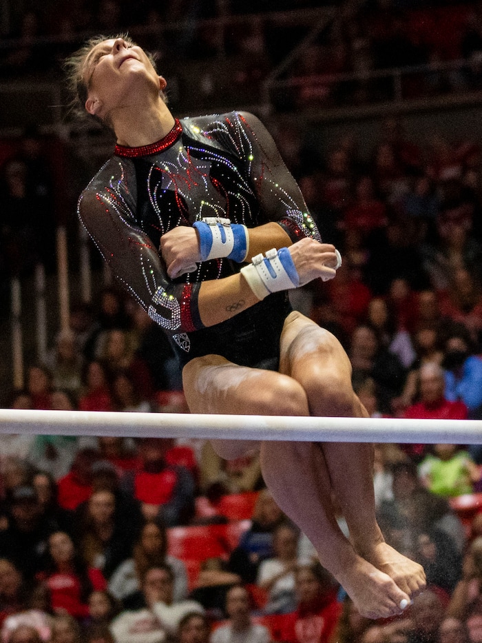 (Rick Egan | The Salt Lake Tribune)  Grace McCallum performs on the bars, in gymnastics action between Utah Red Rocks and Oregon State, at the Jon M. Huntsman Center, on Friday, Feb. 2, 2024.
