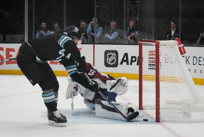 (Bethany Baker  |  The Salt Lake Tribune) Utah Hockey Club left wing Matias Maccelli (63) scores as Colorado Avalanche goaltender Justus Annunen (60) defends during the game between the Utah Hockey Club and the Colorado Avalanche at the Delta Center in Salt Lake City on Thursday, Oct. 24, 2024.