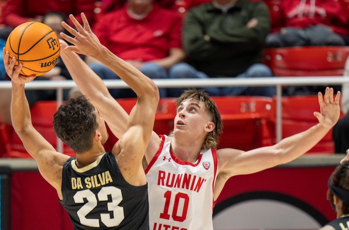 (Rick Egan | The Salt Lake Tribune) Utah Utes forward Jake Wahlin (10) guards Colorado Buffaloes forward Tristan da Silva (23), in PAC-12 basketball action between the Utah Utes and the Colorado Buffaloes a the Jon M. Huntsman Center, on Saturday, Feb. 3, 2024.
