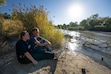 (Francisco Kjolseth | The Salt Lake Tribune) Cheyenne Green and Clayton Bowen share a quiet moment along the Jordan River in Murray on Thursday, Oct. 3, 2024.